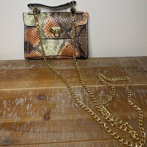 Tiny snake print two tone purse